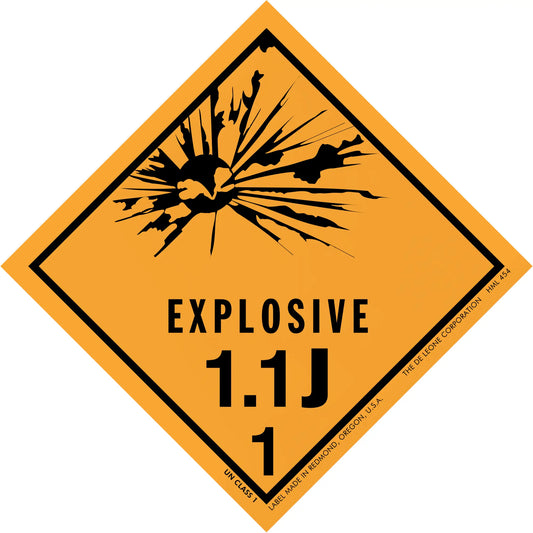 Diamond-shaped orange warning sign displaying ’EXPLOSIVE 1.1J 1’’ with an explosion symbol.