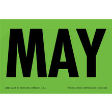 Bold black text spelling ’MAY’ on a green background.