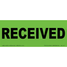Green label with black text reading ’RECEIVED’