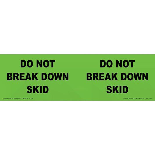 Green warning label with black text reading ’DO NOT BREAK DOWN SKID’ repeated twice.