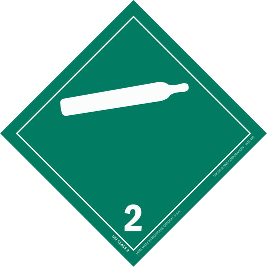Green diamond-shaped hazard placard with number 2 and compressed gas cylinder symbol.