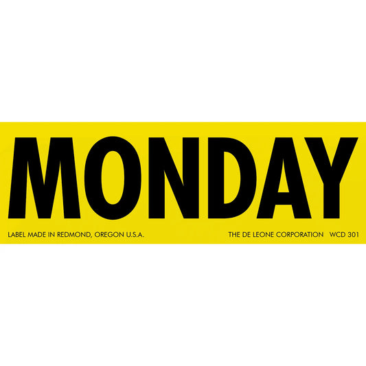 Bold black text spelling ’MONDAY’ on a yellow rectangular label.