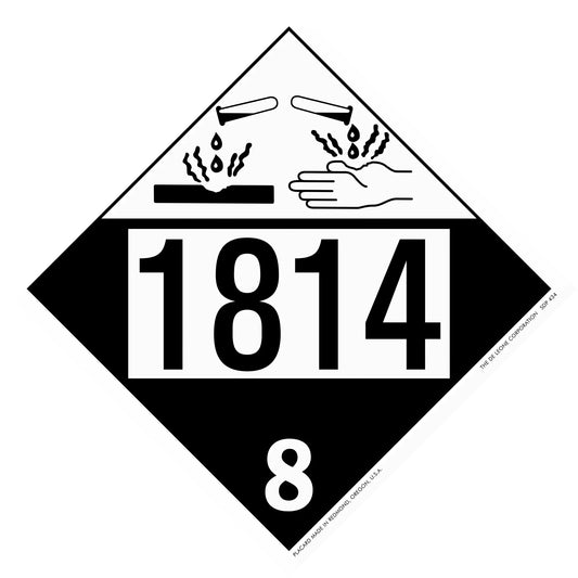 Black and white hazardous material placard with number 1814 and corrosive symbol showing hands being damaged.