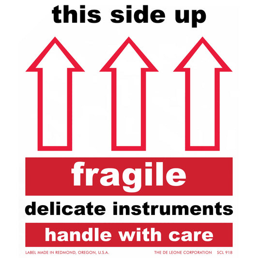 Red and black shipping label with upward arrows indicating fragile contents requiring careful handling.