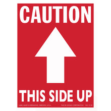 Red caution sign with white arrow pointing upward and text reading ’THIS SIDE UP’