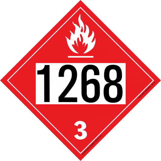Red diamond-shaped hazardous material placard displaying ’1268’’ and ’3’’ with a flame symbol.