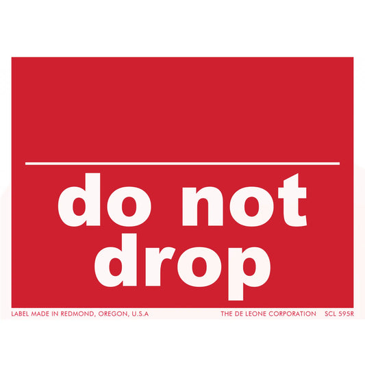 Red warning label with white text that reads ’do not drop’