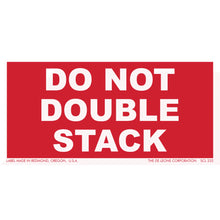 Red warning label with white text reading ’DO NOT DOUBLE STACK’