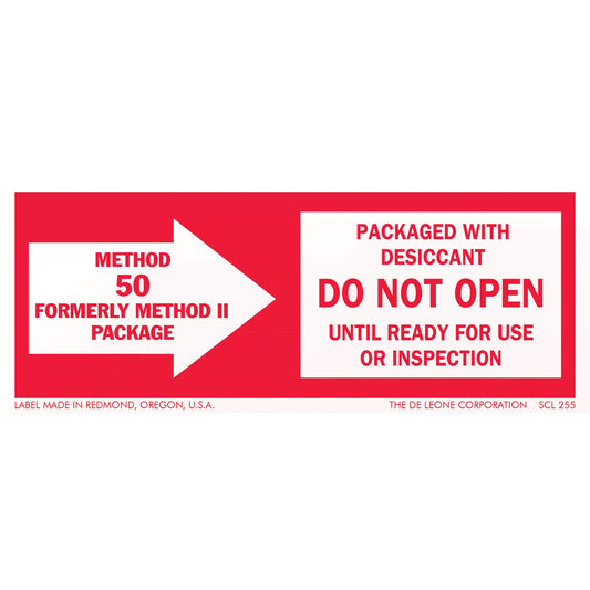 Red and white warning label about packaged desiccant and inspection requirements.