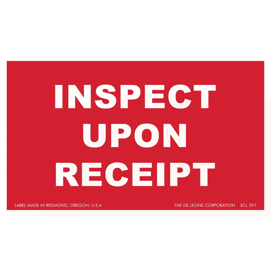 Red label with white text reading ’INSPECT UPON RECEIPT’