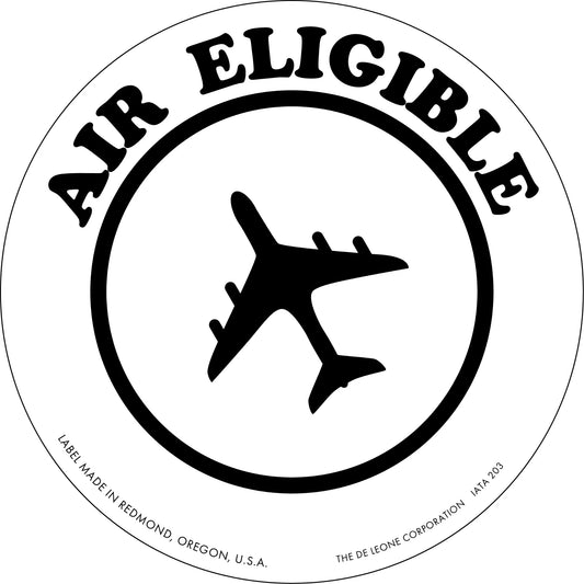 Black and white circular logo featuring an airplane silhouette with ’AIR ELIGIBLE’ text around the top.