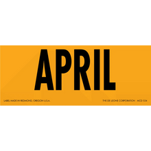 Bold black text spelling ’APRIL’ on an orange background.