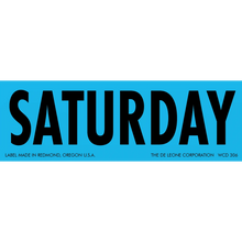 Blue label with ’SATURDAY’ text printed in black letters.