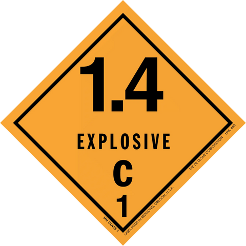 Diamond-shaped orange hazard placard displaying ’1.4 EXPLOSIVE C 1’’ warning symbol.