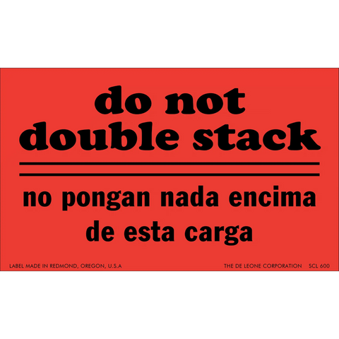 Red warning label with black text in English and Spanish that says ’do not double stack’/’no pongan nada encima de esta carga’