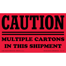 Red caution label warning about multiple cartons in a shipment.