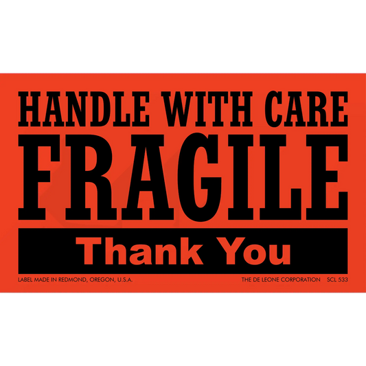 Red and black ’HANDLE WITH CARE - FRAGILE’ shipping label.