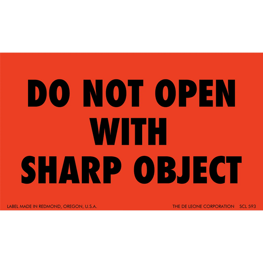 Red warning label with black text reading ’DO NOT OPEN WITH SHARP OBJECT’