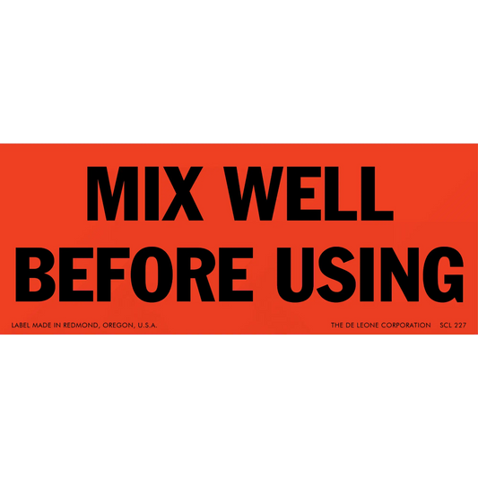 Red warning label with black text that reads ’MIX WELL BEFORE USING’