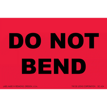 Red warning label with black text reading ’DO NOT BEND’