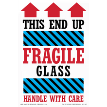 Warning label for fragile glass items with red arrows pointing upward and blue striped bands.