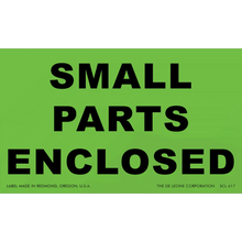 Green shipping label with black text reading ’SMALL PARTS ENCLOSED’