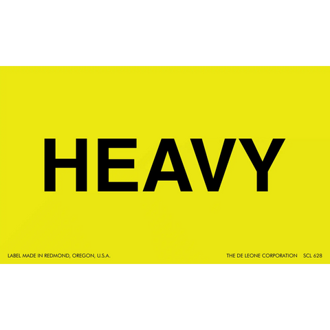 Bold black text spelling ’HEAVY’ on a yellow background.