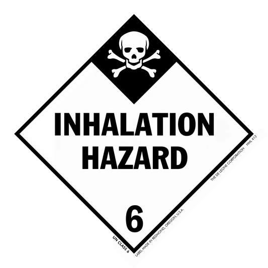 Diamond-shaped warning sign displaying ’INHALATION HAZARD’ with a skull and crossbones symbol and number 6.