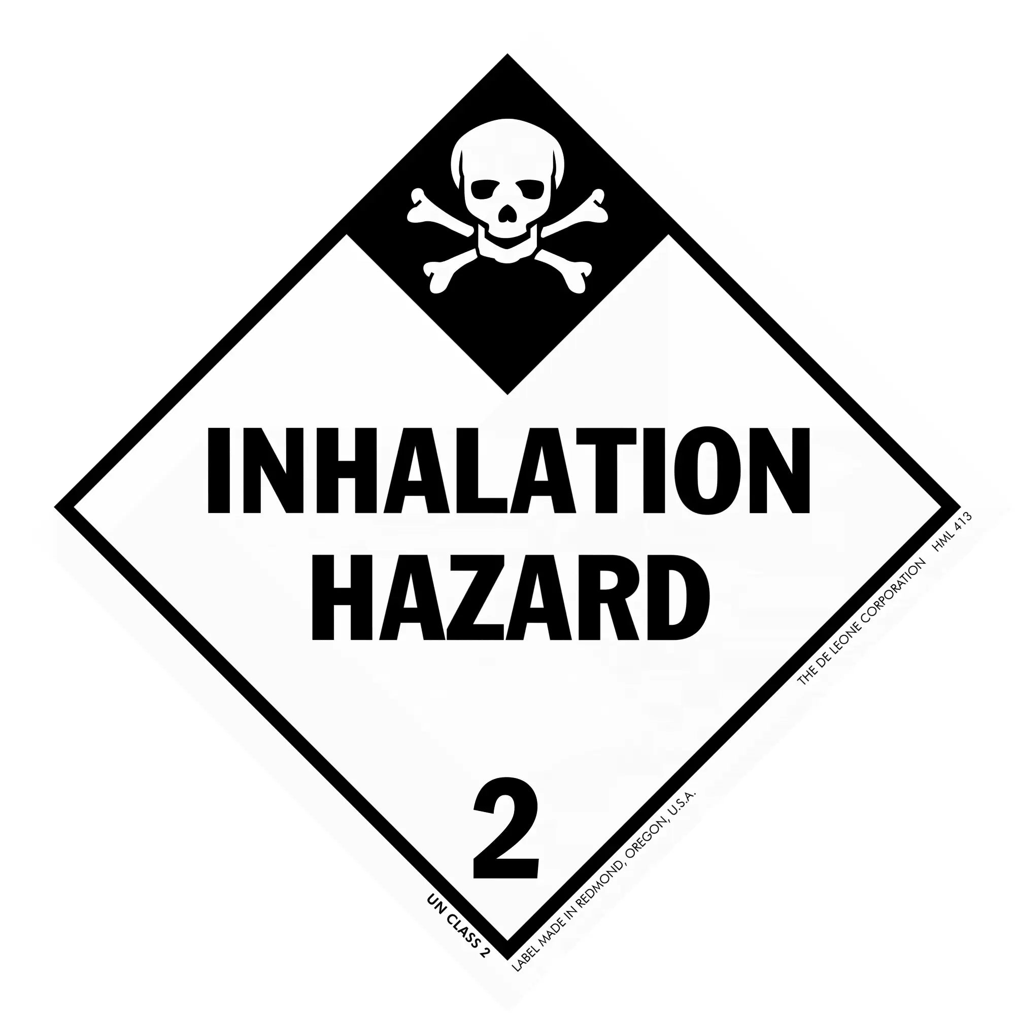Black and white diamond-shaped warning sign displaying ’INHALATION HAZARD 2’’ with a skull and crossbones symbol.