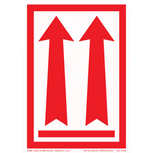 Two red upward-pointing arrows within a red rectangular border.