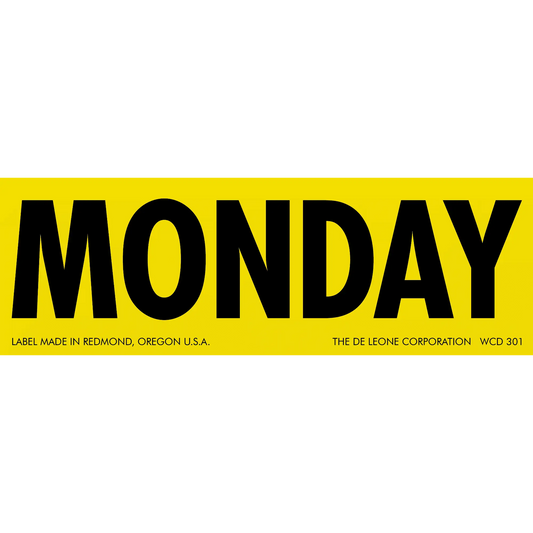 Bold black text spelling ’MONDAY’ on a yellow rectangular label.