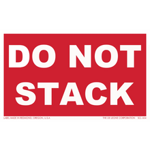 Red warning label with white text reading ’DO NOT STACK’