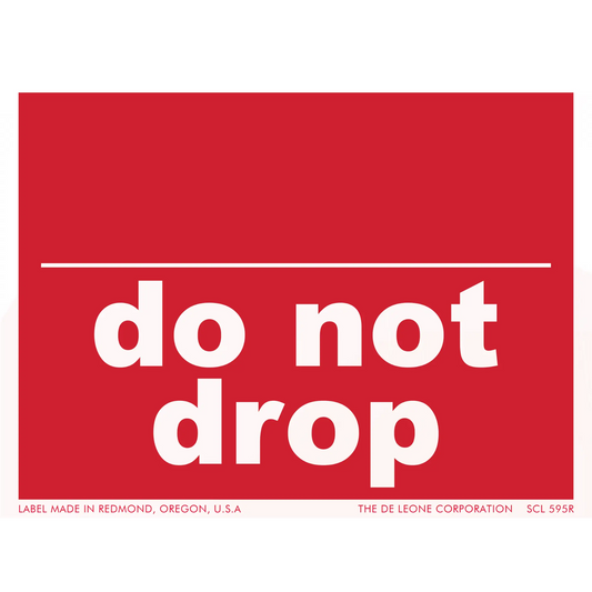 Red warning label with white text that reads ’do not drop’