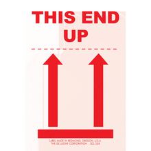 Red ’THIS END UP’ shipping label with upward-pointing arrows.