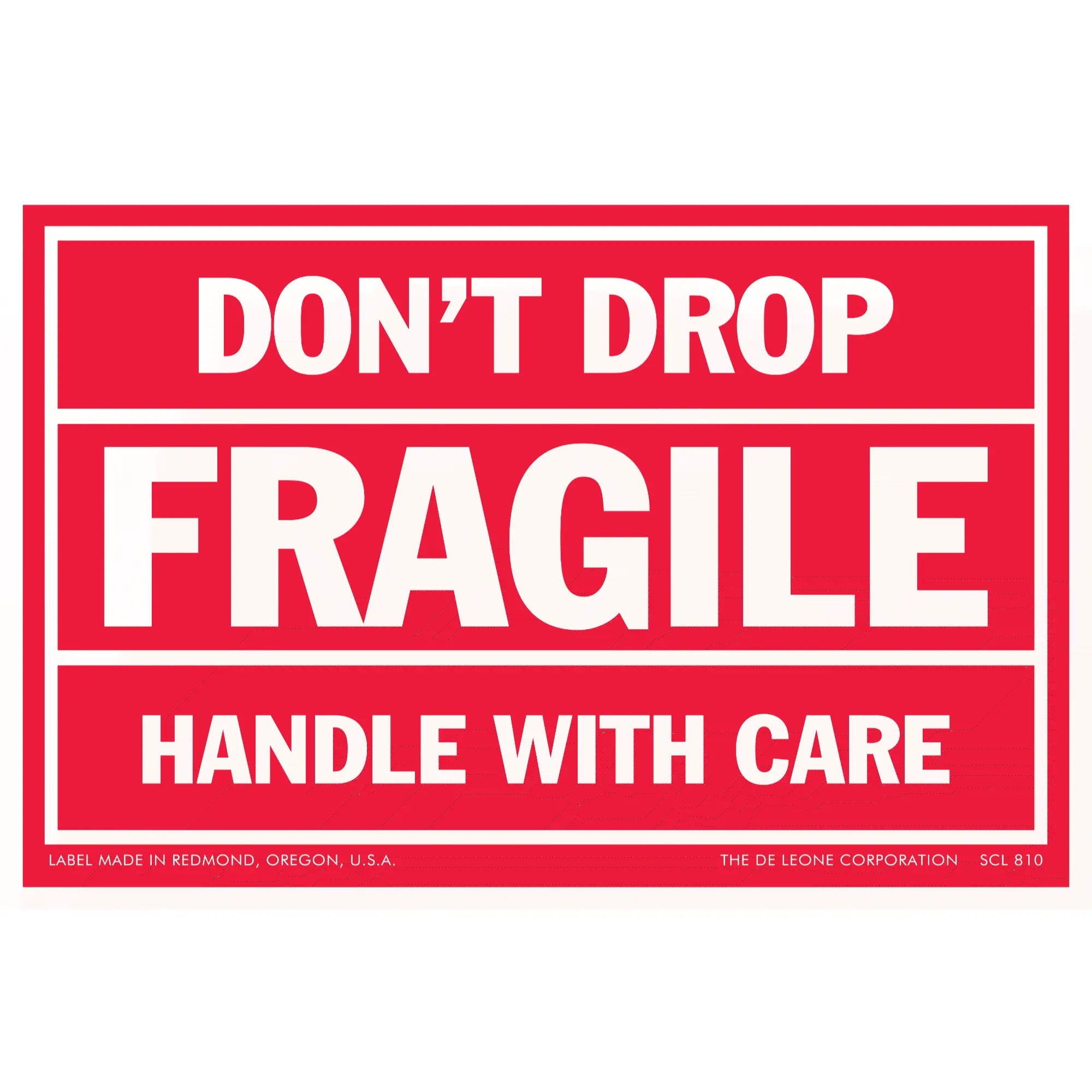 Red warning label with white text reading ’DON’T DROP FRAGILE HANDLE WITH CARE’
