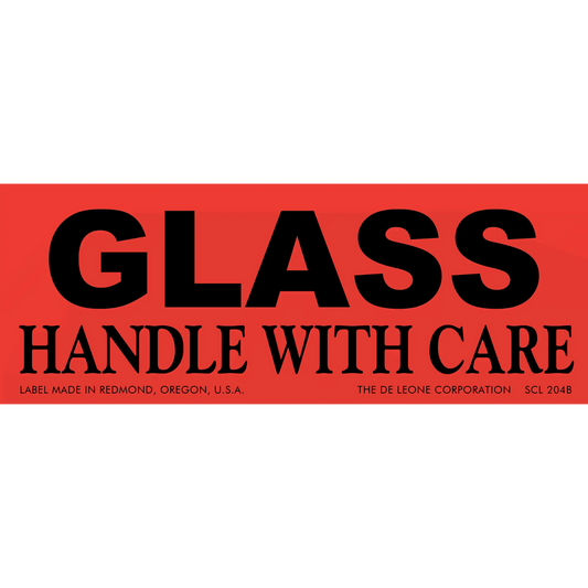 Red warning label with black text reading ’GLASS HANDLE WITH CARE’