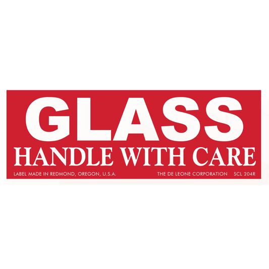 Red warning label with white text reading ’GLASS HANDLE WITH CARE’