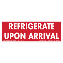 Red and white warning label stating ’REFRIGERATE UPON ARRIVAL’