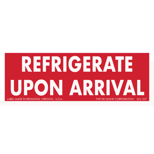 Red and white warning label stating ’REFRIGERATE UPON ARRIVAL’