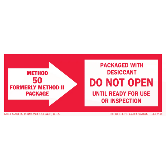 Red and white warning label about packaged desiccant and inspection requirements.