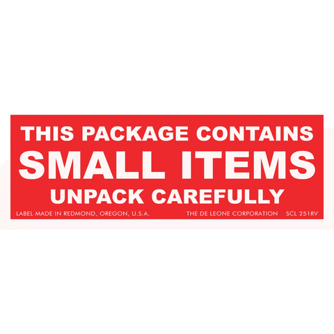 Red warning label with white text stating ’THIS PACKAGE CONTAINS SMALL ITEMS UNPACK CAREFULLY’