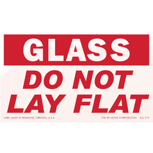 Red and white warning label that reads ’GLASS DO NOT LAY FLAT’