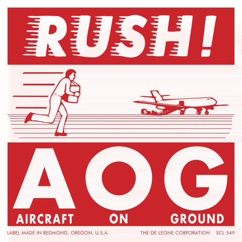 Red and white warning label showing a figure rushing toward an airplane with ’AOG’ (Aircraft On Ground) text.