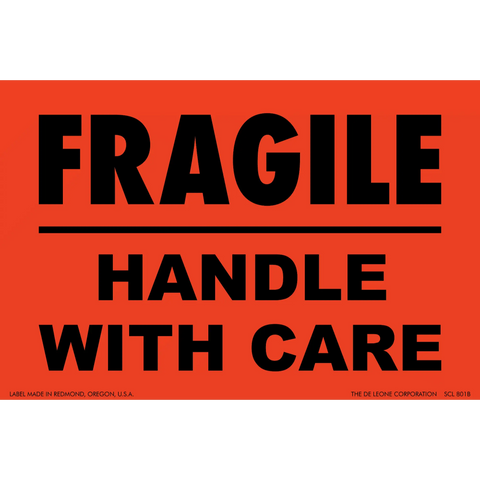 Red warning label with black text reading ’FRAGILE HANDLE WITH CARE’