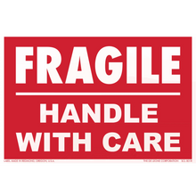 Red and white warning label that reads ’FRAGILE HANDLE WITH CARE’