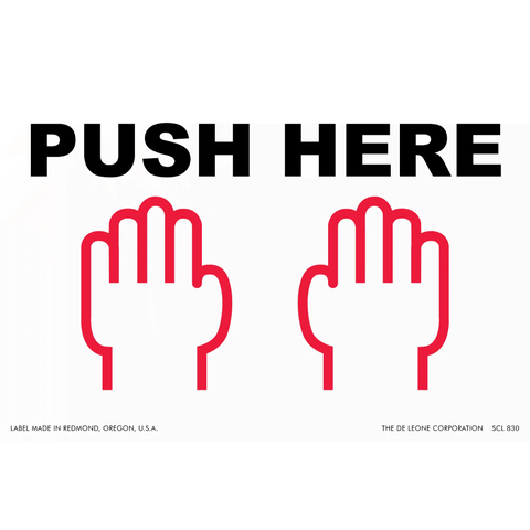 A ’PUSH HERE’ sign with two red hand icons below the text.