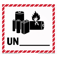 Warning label for batteries with hazard symbols showing flames and battery icons in a red-striped border.