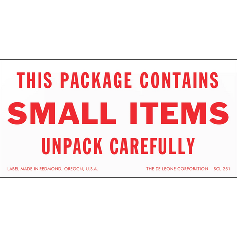 Warning label with red text stating ’THIS PACKAGE CONTAINS SMALL ITEMS UNPACK CAREFULLY’